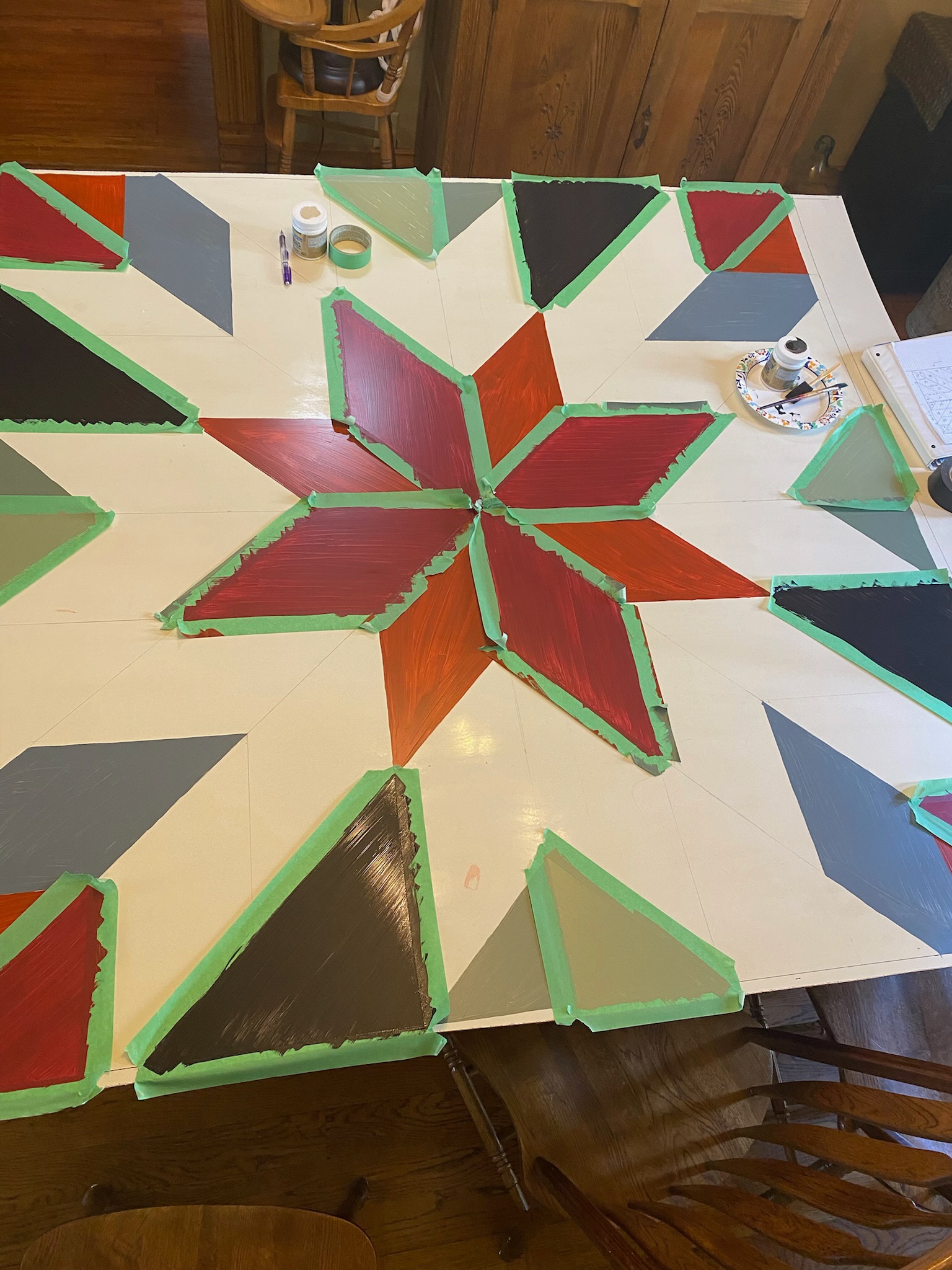 painting sections of the barn quilt