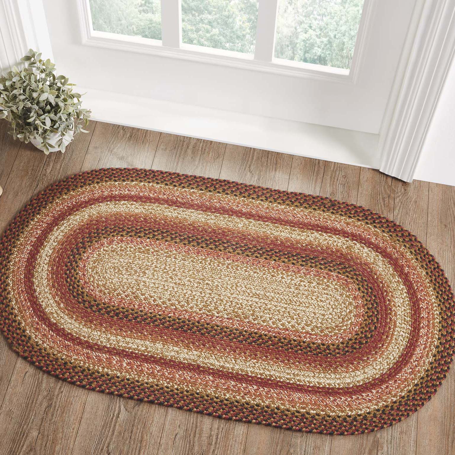 Ginger spice oval braided rug 27x48