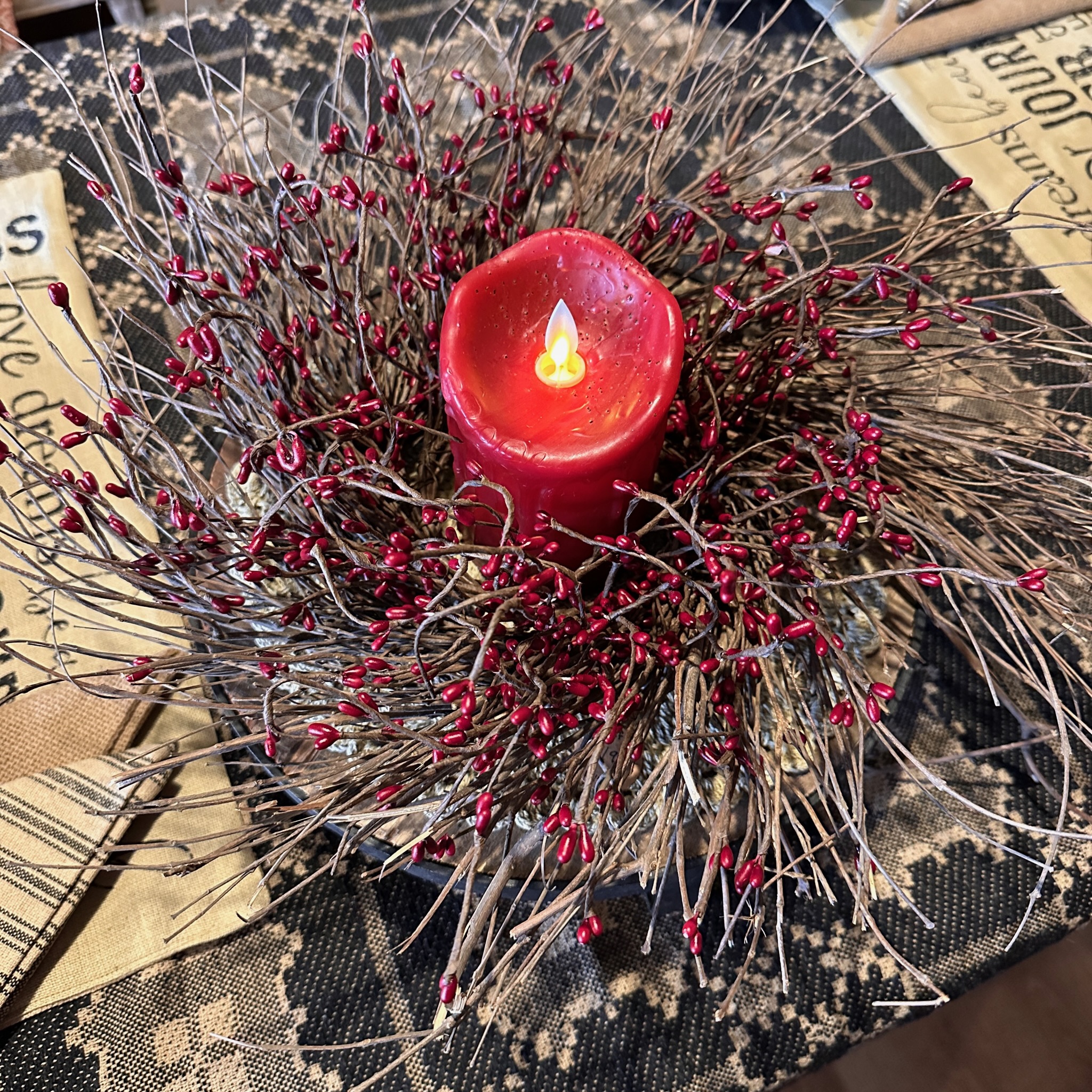 twig wreath with burgundy pip berries